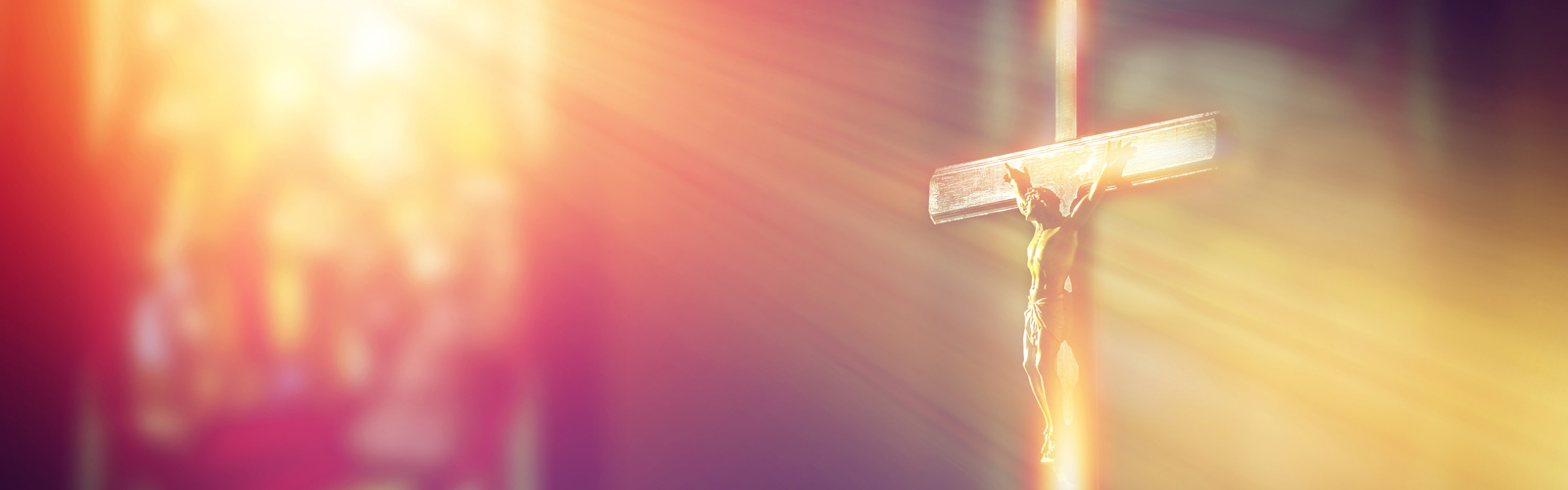 light shining on crucifix