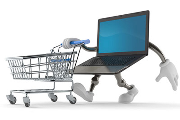 laptop pushing a shopping cart