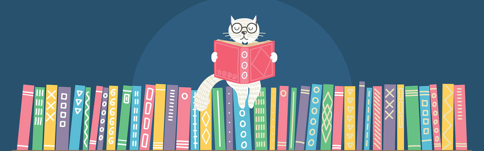 Cat reading on a stack of books