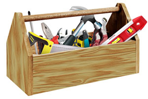 A wooden toolbox filled with tools