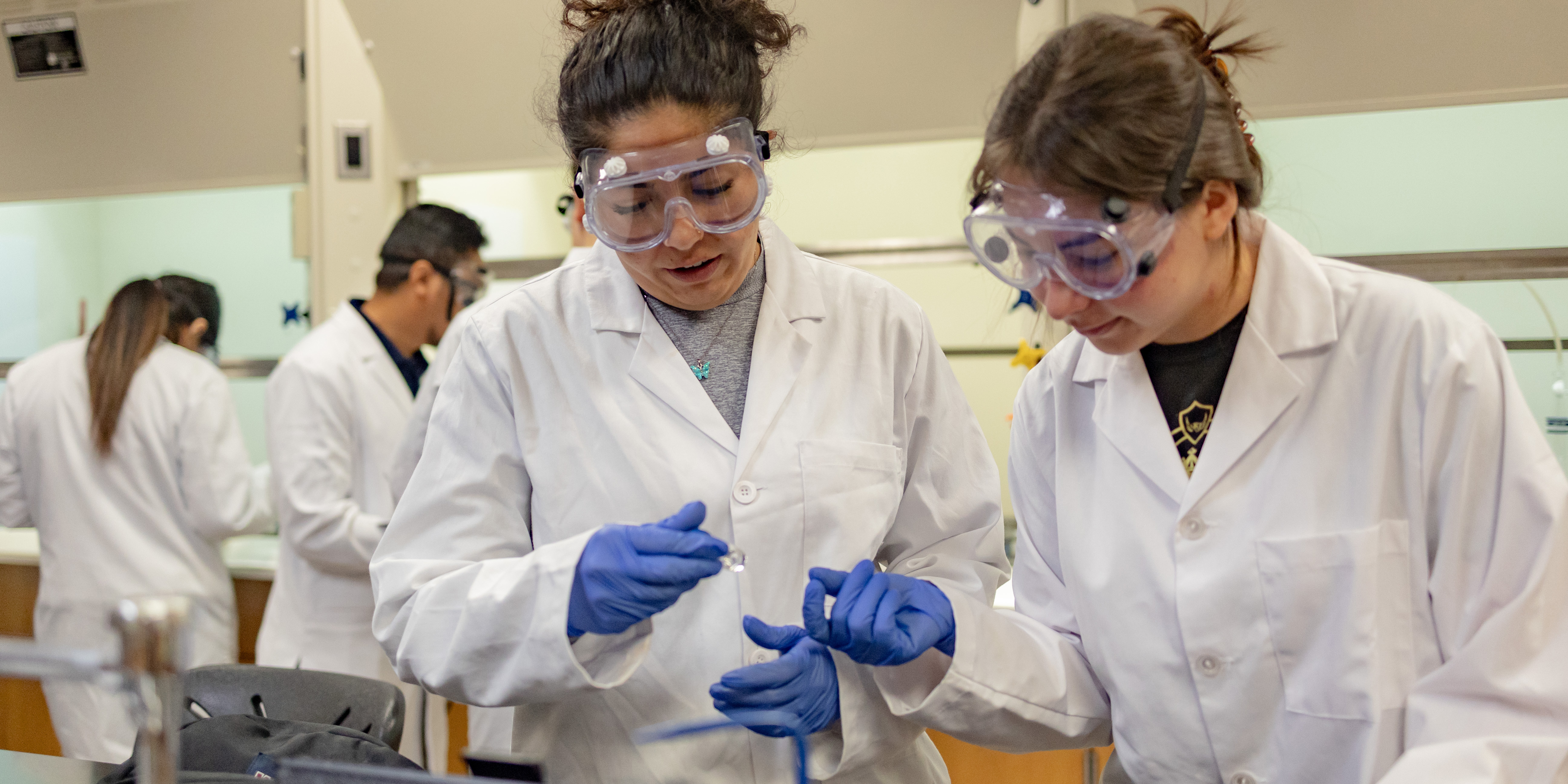 Two female STEM students in a lab