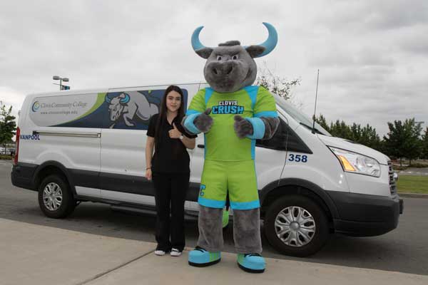 Clovis bus shuttle with student and crush mascot