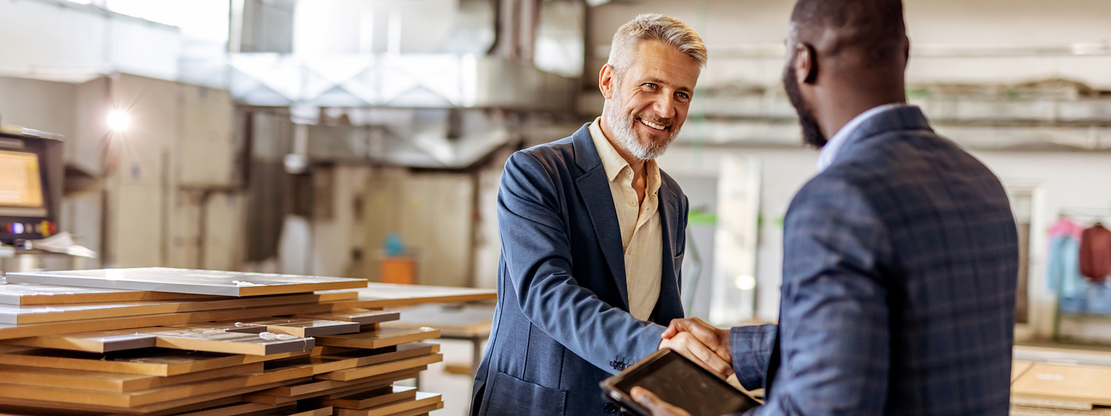 A business consultant in a warehouse
