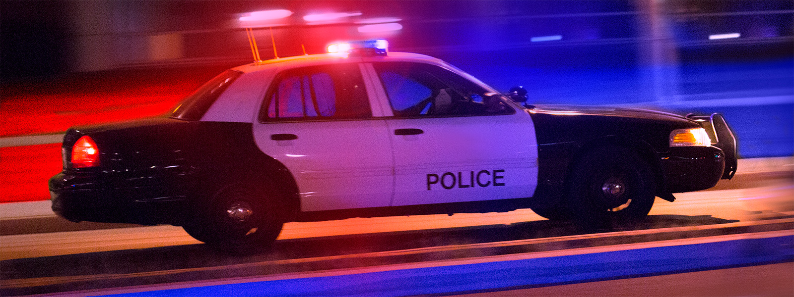 A speeding police car