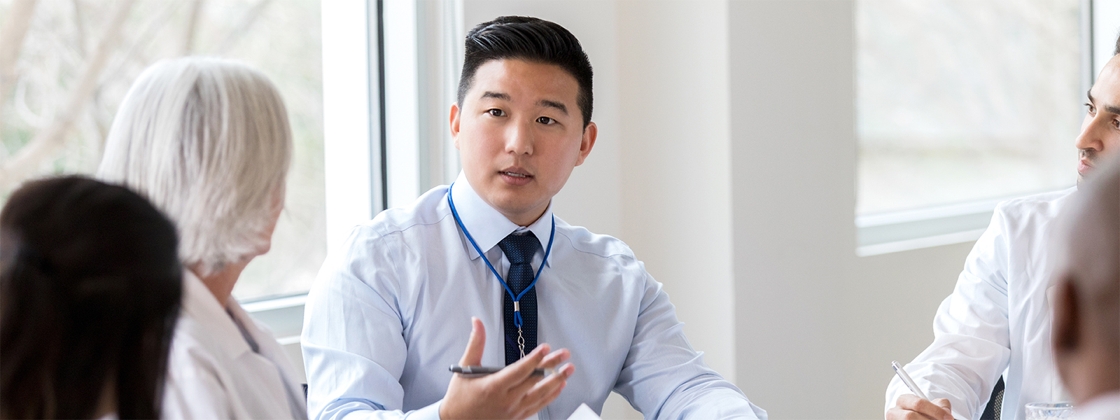 A selection of images of people various health care administration professions