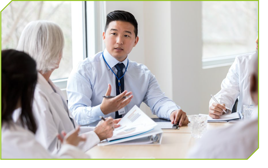 A group of professionals meeting around a table