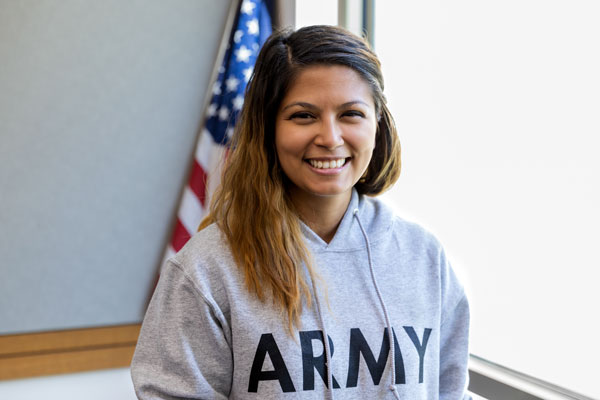 Veteran student with Army sweater