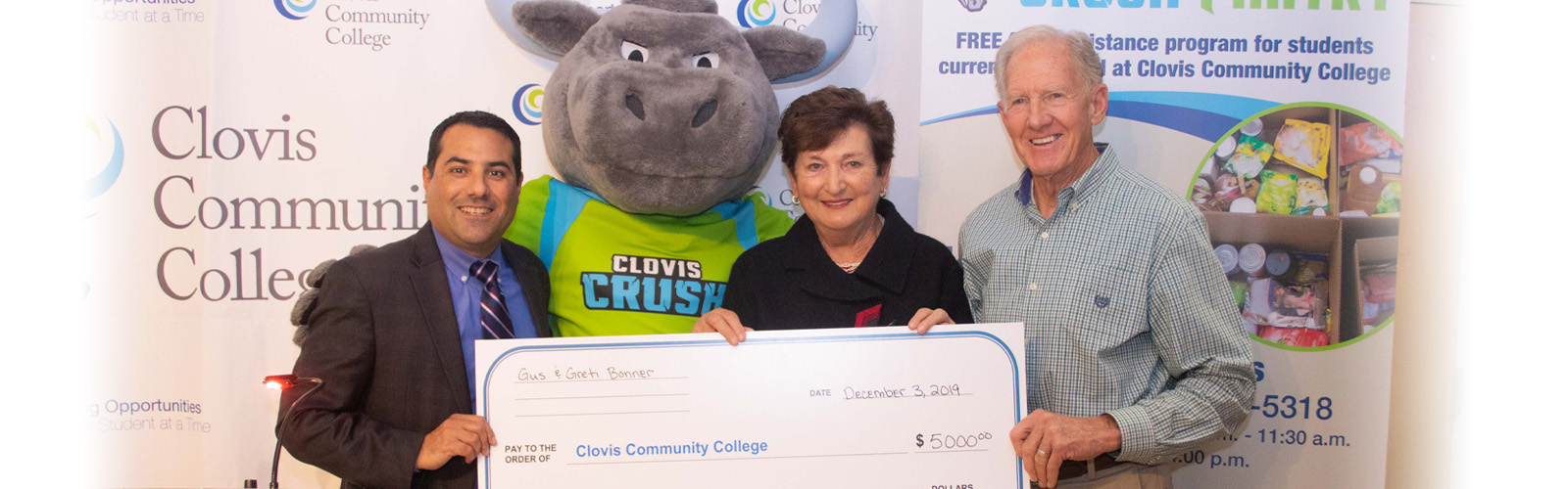 Gus and Greti Bonner presenting their check for five thousand dollars