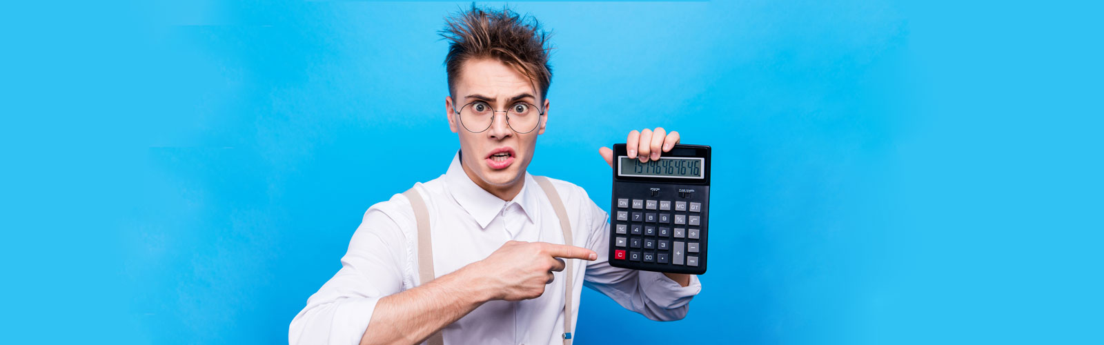Student holding a calculator