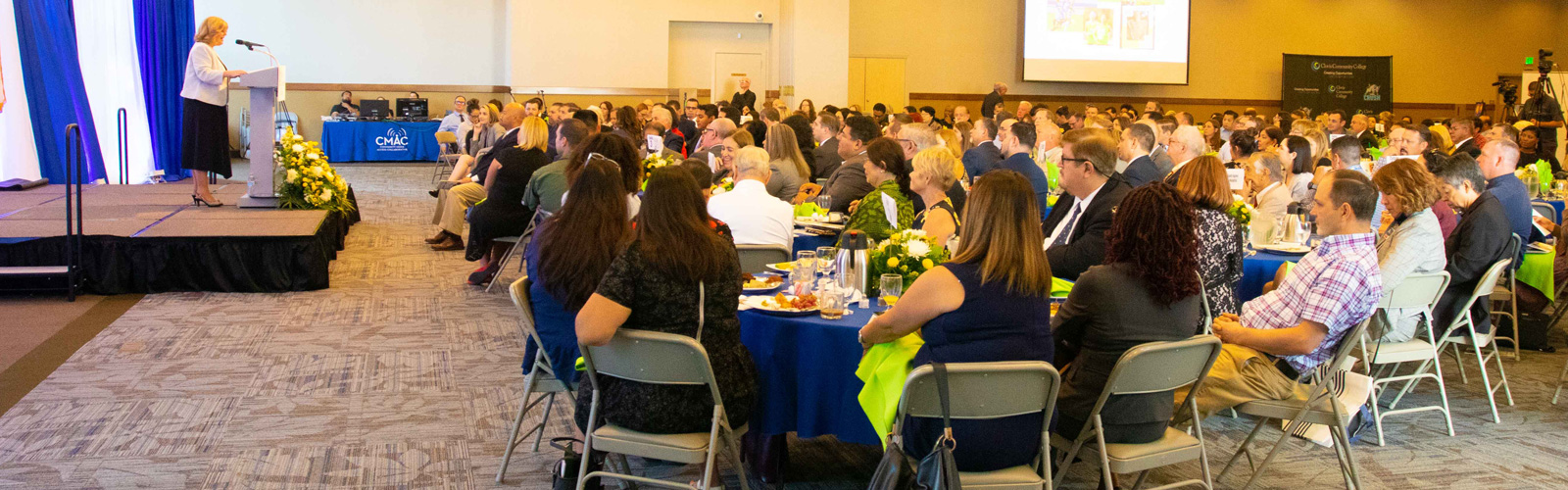 President Bennett delivering her speech at the second annual president's breakfast