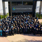  Students in large group photo at commencement event