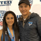 Clovis Crush student-athlete Katrina Thompson with coach Orlando Ramirez at the USCA Convention in Philadelphia.