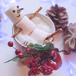 Marshmallow snowman on top of a mug