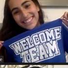 A female student at CCC with a Welcome T-shirt