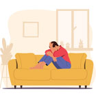 person sitting on sofa feeling destressed 