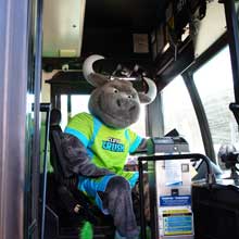 The Crush Mascot Driving the FAX Bus