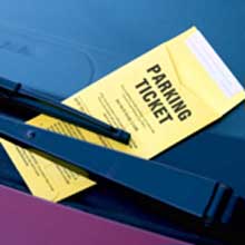 parking ticket on car windshield