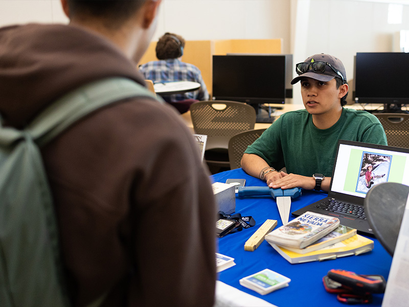 A male student at the STEM Job Fair