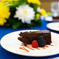 A fancy slice of chocolate cake