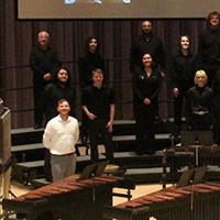 Tony Gennaro conducting a choir