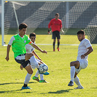 men playing soccer