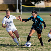 Women playing soccer