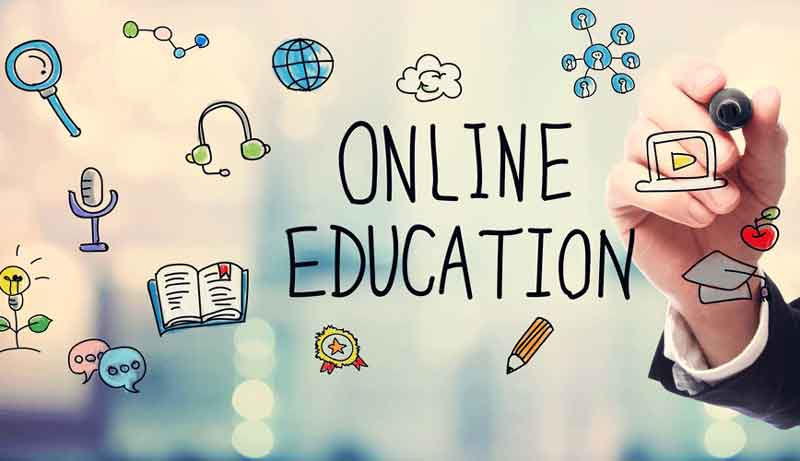Distance Education written on an illustrated screen using a black marker pen.