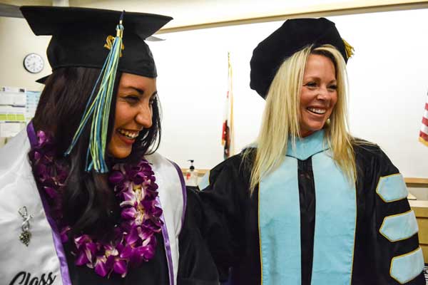 A female student of the OTA program with an OTA faculty member