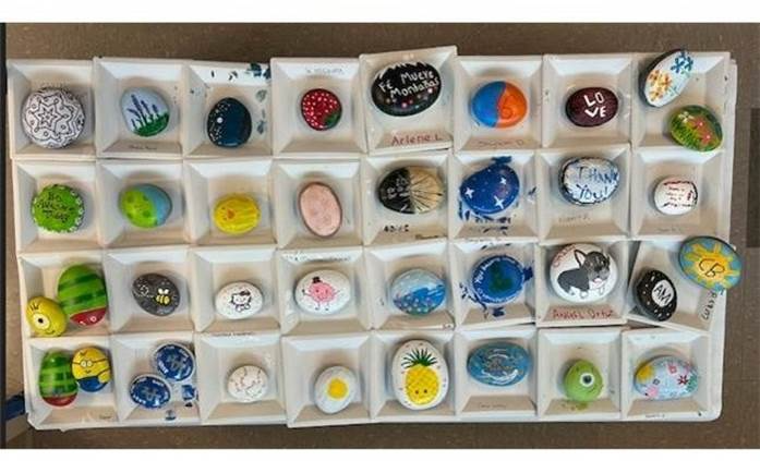 painted rocks on a table