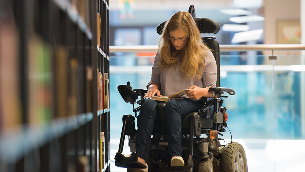 disabled student in the library