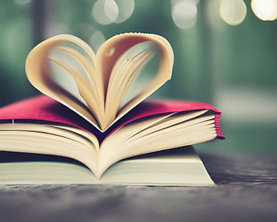 a book with pages shaped like a heart