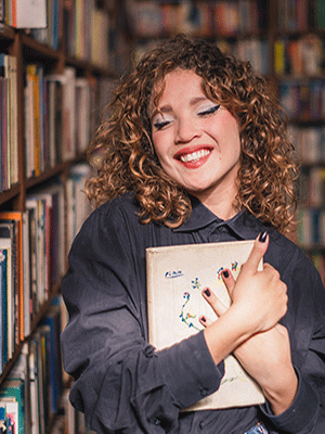 Girl holding book