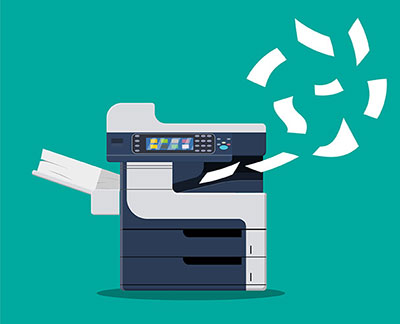 a printer spewing paper