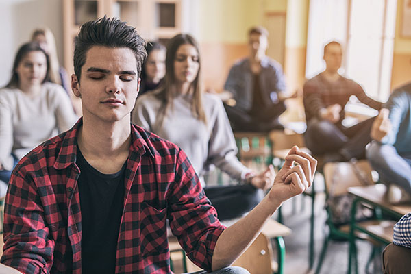 Students meditating