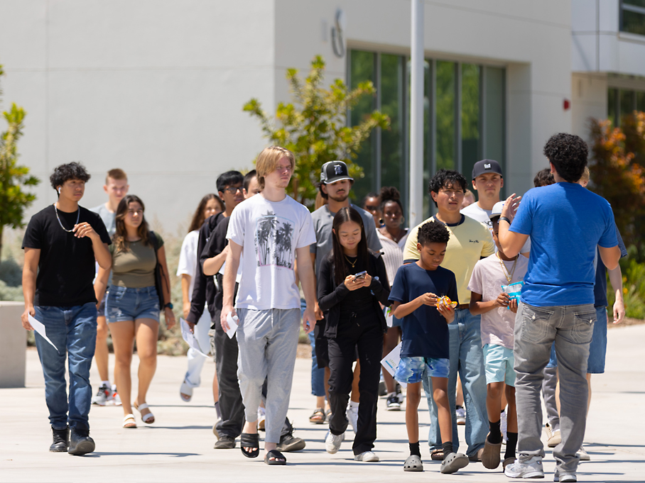 Outreach staff and students tour the campus
