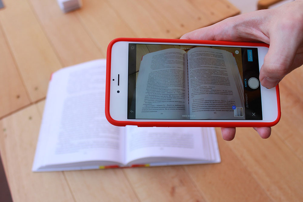 Cellphone taking a picture of a book